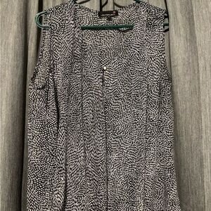 Elegant Black and White Sleeveless Blouse